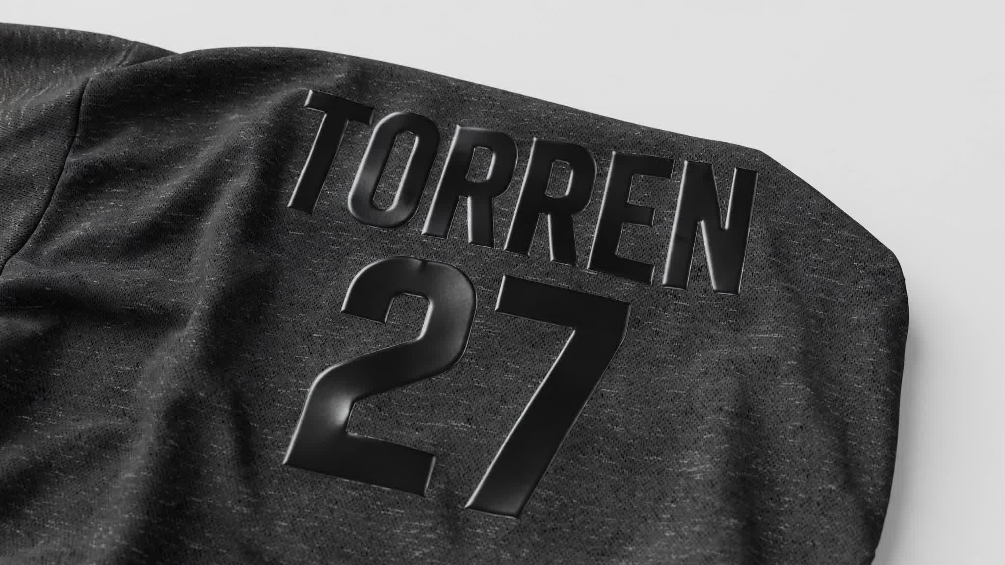Close-up of precision heat-transfer graphics on performance apparel